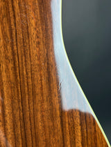 Close-up of a wooden surface with a dark background