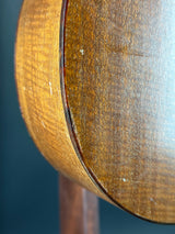 Close-up of a wooden surface with a dark blue background