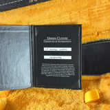 Gibson Custom Certificate of Authenticity on a textured surface