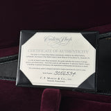 Certificate of Authenticity for a C.F. Martin guitar on a dark background