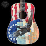 Acoustic guitar with American flag and eagle design on a black background