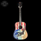 Acoustic guitar with American flag and eagle design on a black background
