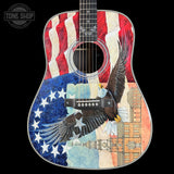 Acoustic guitar with American flag and eagle design on a black background