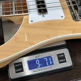 Used Rickenbacker 4003 Mapleglo on scale displaying weight.