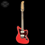 A red electric guitar with a double-cutaway body, maple neck, and gold-toned headstock, shown against a solid black background. A Tone Shop watermark is visible in the top-left corner.