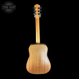 Back view of a wooden acoustic guitar on a black background with 'Tone Shop' logo.
