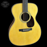Front angle of Used Martin Custom Shop OM-28 Adirondack / Wild East Indian Rosewood.