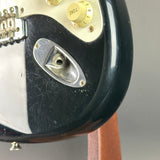Wear on body of Used 1988 MIJ Squier Black.