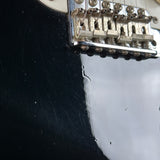 Wear on body of Used 1988 MIJ Squier Black.