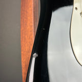 Wear on body of Used 1988 MIJ Squier Black.