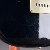 Wear on back of Used 1988 MIJ Squier Black.