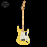 Yellow electric guitar with a white pickguard on a black background, featuring 'Tone Shop' branding.