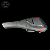 Guitar case with visible branding on a black background