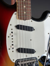 Pickguard of Vintage 1974 Fender Mustang 3 Color Sunburst.
