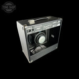 Guitar amplifier with 'Tone Shop' logo in the corner