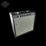 Fender guitar amplifier on a black background with 'Tone Shop' logo.
