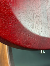 Close-up of a red leather surface with a textured pattern