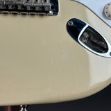 Wear on body of Used 1996 Fender Jimmy Vaughan White.