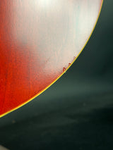 Close-up of a red and yellow object with a dark background