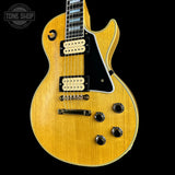 Front angle of Gibson Custom Limited 57 Les Paul Custom All Korina Antique Natural VOS.