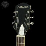 Headstock of Vintage 1960s Silvertone 1446 Black.