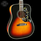 Front angle of Gibson Custom Made 2 Measure Hummingbird Maple Long Scale Tri-burst LR Baggs VTC.