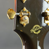 Wear on back of headstock of Used 2006 Gibson Western Classic Sunburst.
