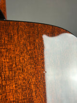 Ding on back of Used 2005 Collings OM2H All Mahogany.