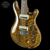 Wooden electric guitar with a dark finish on a black background, featuring the Tone Shop logo.