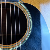 Wear near soundhole of Vintage 1960 Martin 000-28.