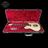 Electric guitar in a red case with 'EVH' logo on a black background