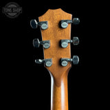 Back of headstock of Used 2022 Taylor 514ce Sunburst.