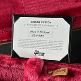 Gibson Custom Certificate of Authenticity on a red guitar