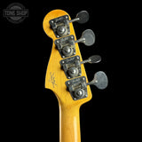 Back of headstock of Used 2013 Fender Custom Shop '64 Precision Bass Relic Red Sparkle over Sunburst.