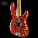 Front angle of Used 2013 Fender Custom Shop '64 Precision Bass Relic Red Sparkle over Sunburst.