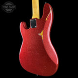 Back angle of Used 2013 Fender Custom Shop '64 Precision Bass Relic Red Sparkle over Sunburst.