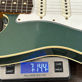 Used 2021 Fender Custom Shop Double Bound Strat Sherwood Green Metallic on scale displaying weight.