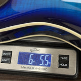 Used PRS SE Hollowbody II Blue Fade on scale displaying weight.