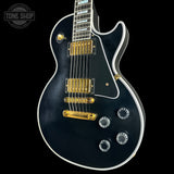 Front angle of Used Gibson Dealer Select Les Paul Custom Chambered Ebony Murphy Ultra Light Aged.
