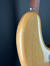 Wear on body of Used 2022 Squier Classic Vibe 70s Jazz Bass Natural.