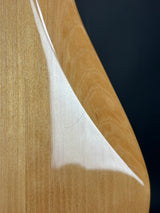 Scratch on back of Used 2022 Squier Classic Vibe 70s Jazz Bass Natural.