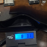 Used 2021 Gibson Les Paul Studio Smokehouse Burst on scale displaying weight.