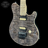 Front angle of Ernie Ball Music Man 30th Anniversary Axis Translucent Black Quilt.