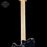 Back of neck of Ernie Ball Music Man 30th Anniversary Axis Translucent Black Quilt.