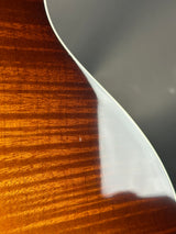 Ding on back of Used Taylor 615ce Sunburst.