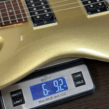 Used Ibanez JS2000 Series Gold MIJ on scale displaying weight.