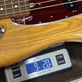 Used Godin Passion RG-4 on scale displaying weight.
