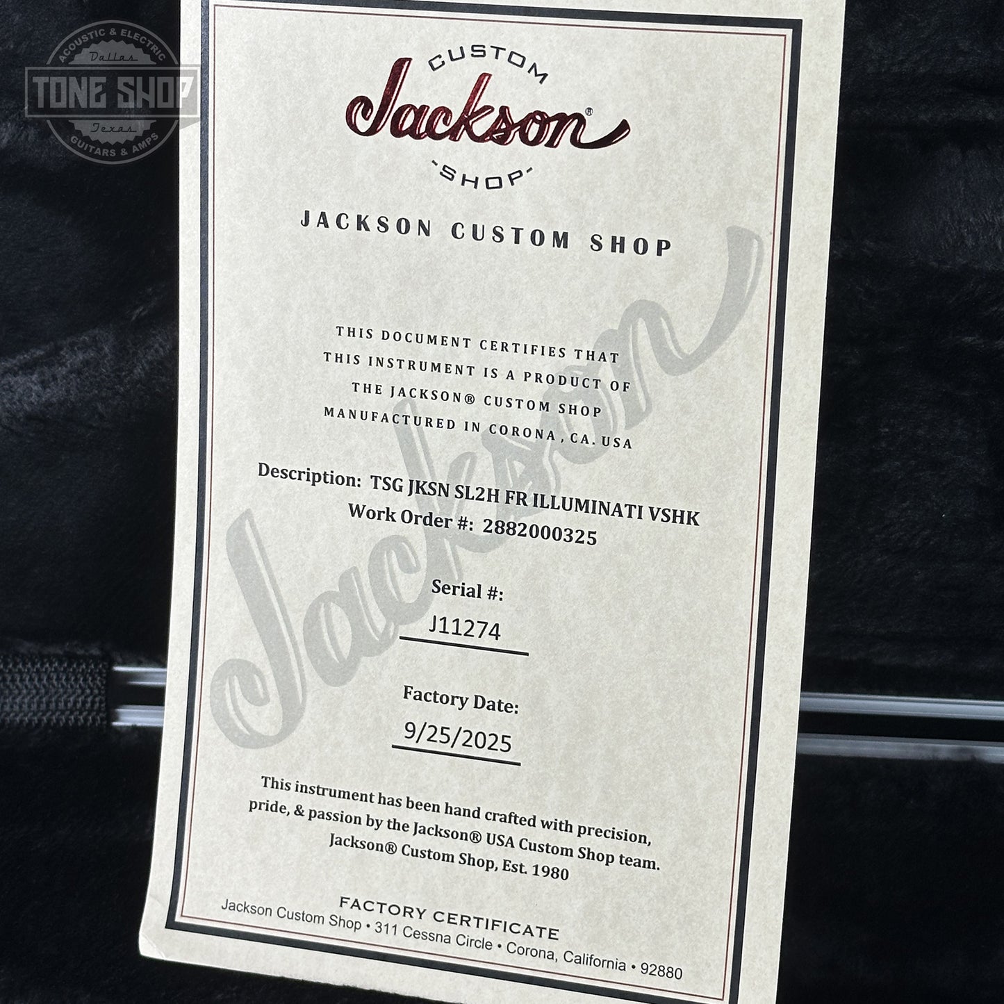 Jackson Custom Shop certificate on a guitar, with 'Tone Shop' branding.
