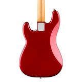The rear view of a glossy red electric guitar body with a light wood neck and a silver metal plate, isolated on a white background.