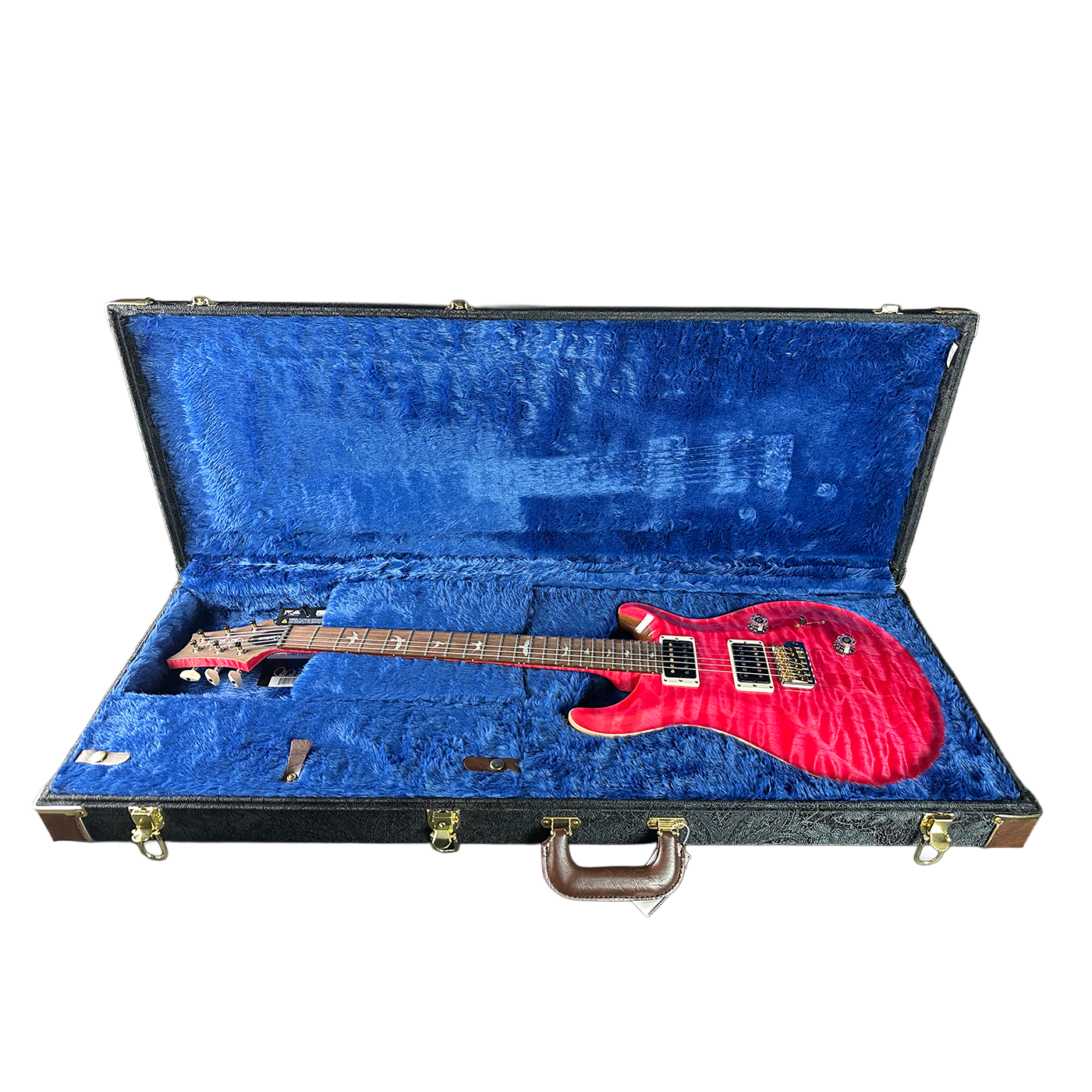 Red electric guitar in a blue-lined case on a white background